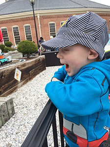 Kid with conductor hat at B and O railroad museum