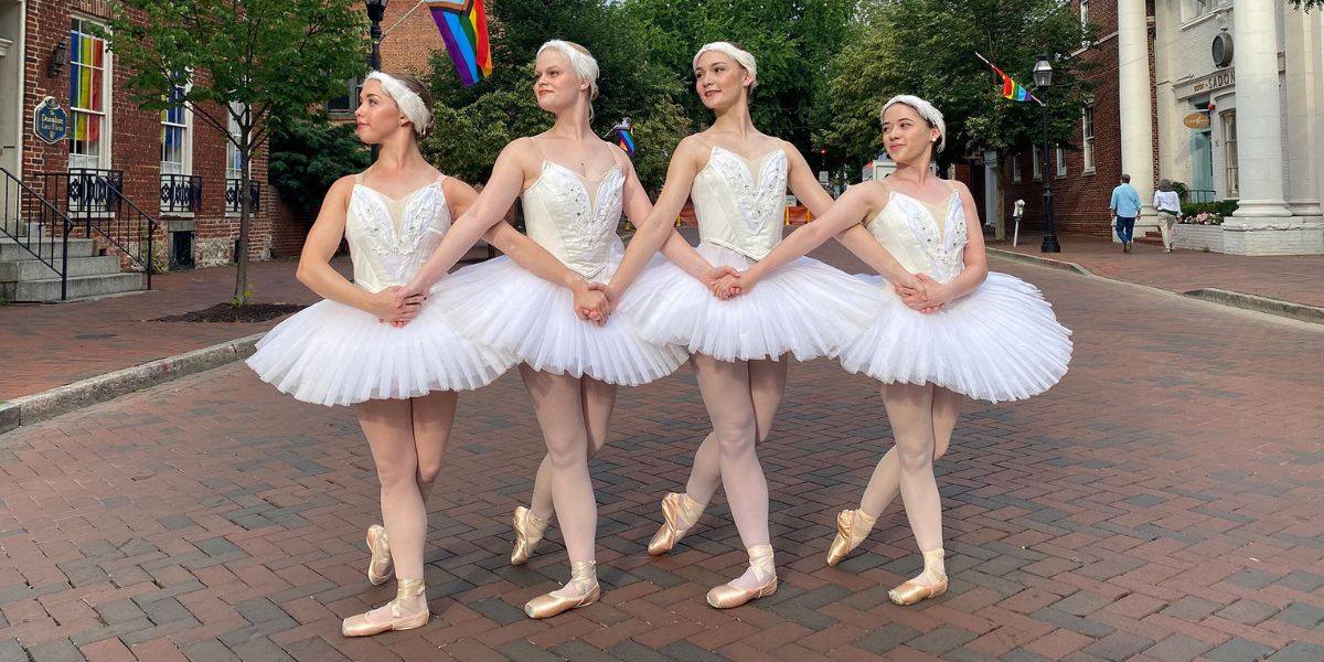 Ballet Dancers joining hands in street of Annapolis